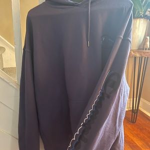 A dark navy blue champion 2 XL hoodie